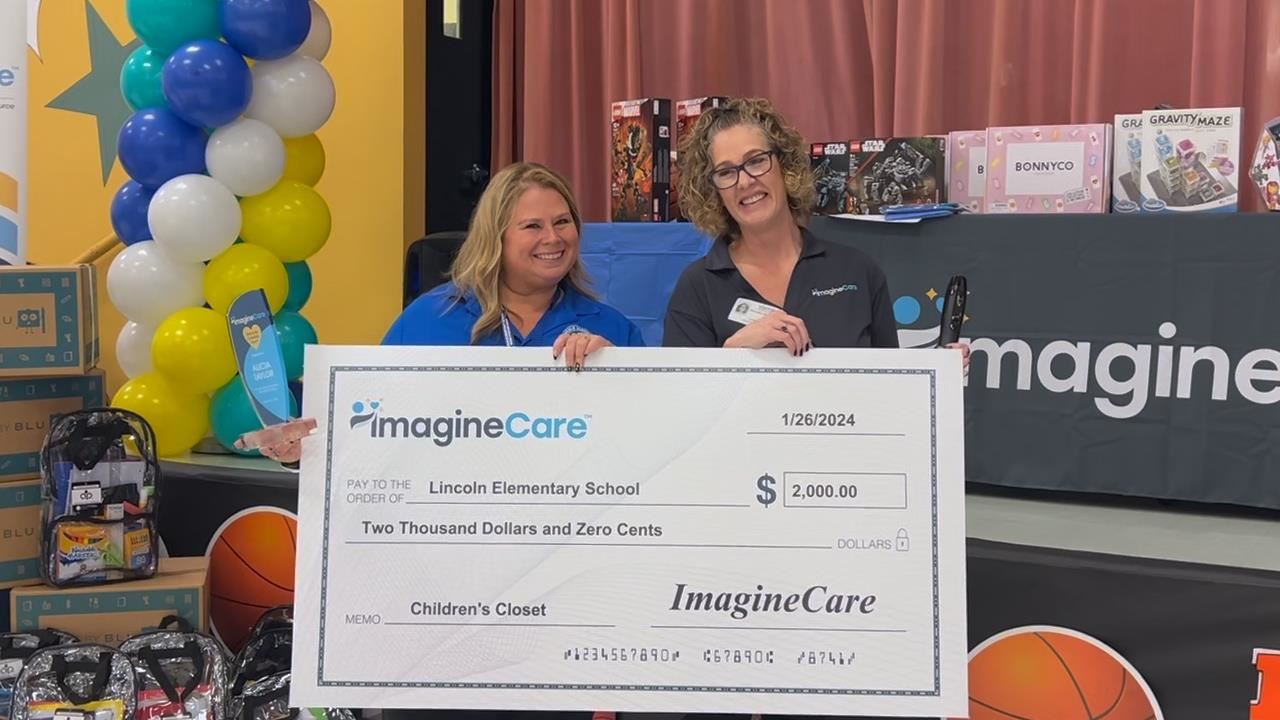  ImagineCare makes donation to Lincoln Elementary